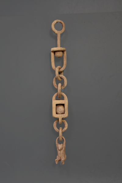 Complete wooden chain after 
		first sanding.