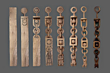 Sequence photos of carving a bear chain from Black Walnut